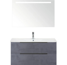 Umyvadlo s umyvadlovou skříňkou a osvětleným zrcadlem