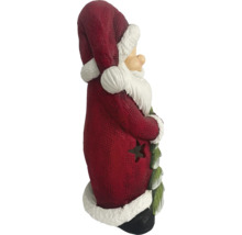 Figurka Santa Clause s vánočním stromkem a hvězdou
