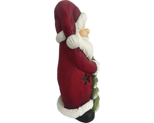 Figurka Santa Clause s vánočním stromkem a hvězdou