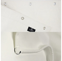 Detailní pohled na neprůhlednou látku s oky a logem Burschberg