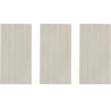 Tři světlé betonové desky s rýhovaným povrchem