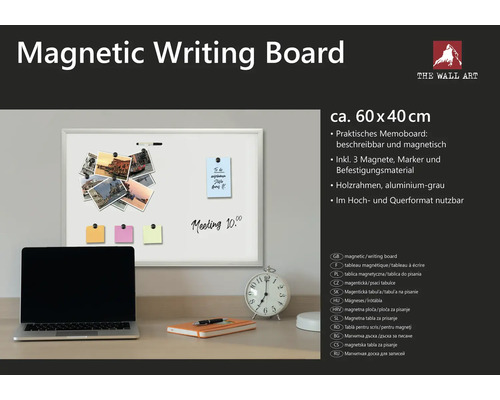 Magnetická psací tabule o rozměrech přibližně 60 x 40 centimetrů s dřevěným rámem a příslušenstvím na stole