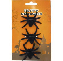 Dekorační pavouci na kartě pro Halloween