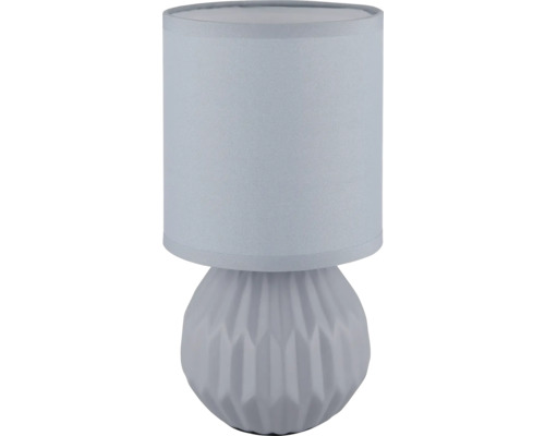 Stolní lampa s látkovým stínidlem a vzorovanou základnou