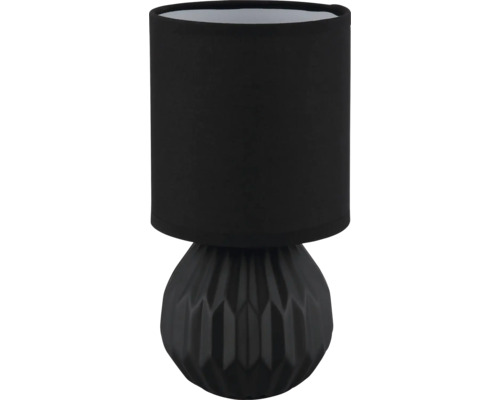 Dekorativní stolní lampa s geometrickým podstavcem a látkovým stínidlem.