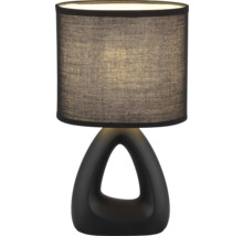 Dekorativní stolní lampa s látkovým stínidlem a otevřenou, trojúhelníkovou základnou