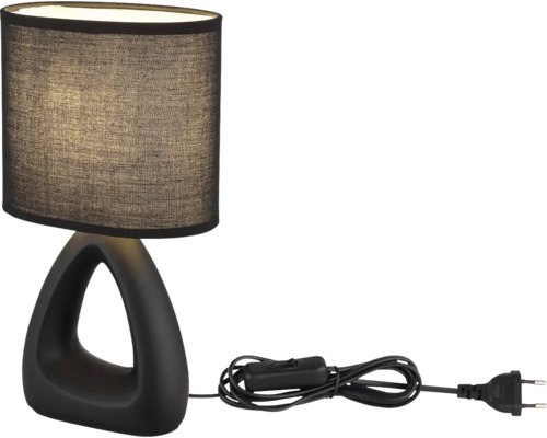 Stolní lampa s tmavým stínidlem a trojúhelníkovou základnou