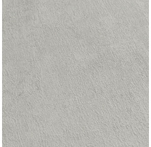 Detail světlé tapety s hrubou strukturou