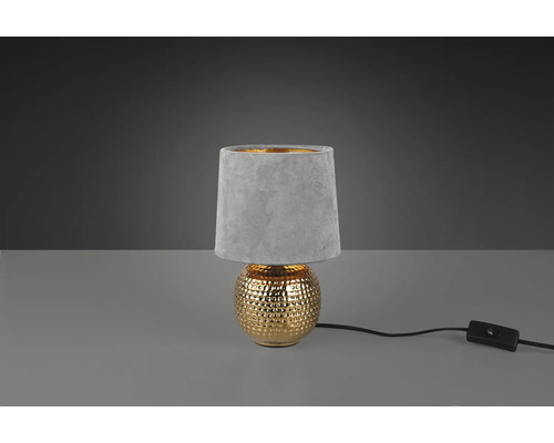 Dekorativní stolní lampa se stínidlem a zlatavou základnou