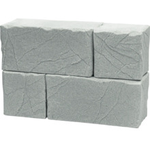 Stohované šedé betonové bloky