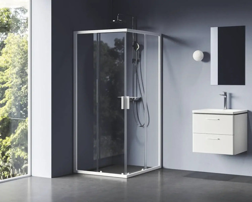 Koupelna se sprchovým koutem, skříňkou pod umyvadlo a zrcadlem