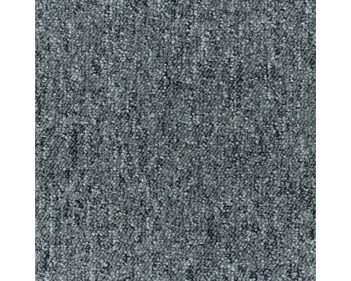 Detail šedého koberce se smyčkovou texturou.