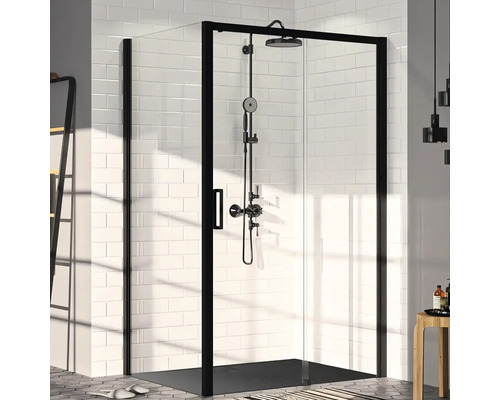Sprchový kout s černým rámem a sprchovým systémem před bílou obkládanou stěnou