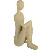 Dekorativní figurka sedící, stylizované ženy