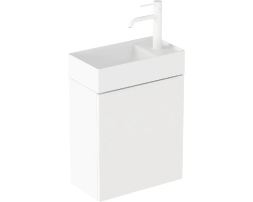 Umyvadlo se skříňkou a vodovodní baterií