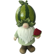 Zahradní trpaslík s melounem jako hlavou a melounem v ruce