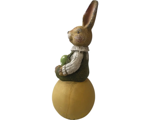 Velikonoční zajíček sedící na kouli