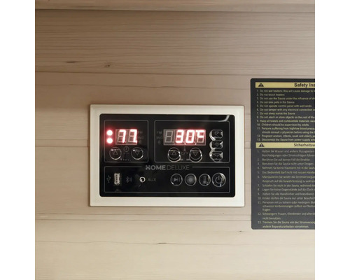 Ovládací panel sauny s digitálním displejem a bezpečnostními informacemi