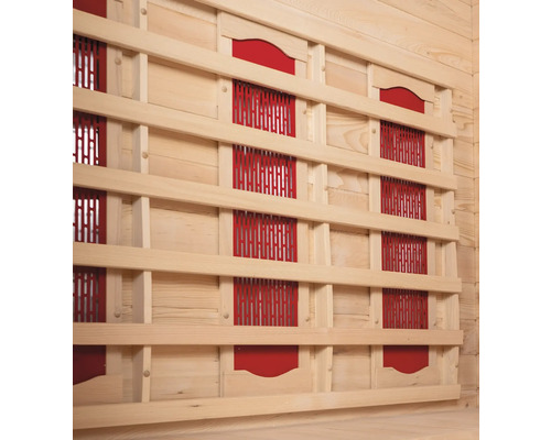 Vnitřní pohled na saunu s dřevěným obložením a infračervenými zářiči