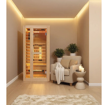 Interiér s infračervenou saunou Home Deluxe, křeslem a odkládacím stolkem