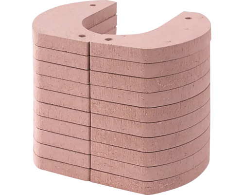 Hromada podkovovitých desek z kamene s otvory