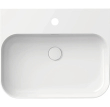 Pohled shora na bílé keramické umyvadlo