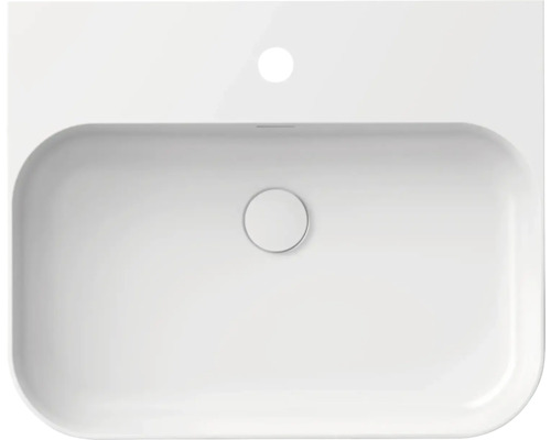 Pohled shora na bílé keramické umyvadlo