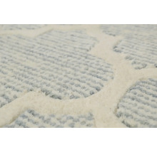 Detail vzorovaného koberce