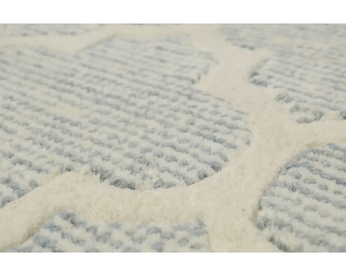 Detail vzorovaného koberce