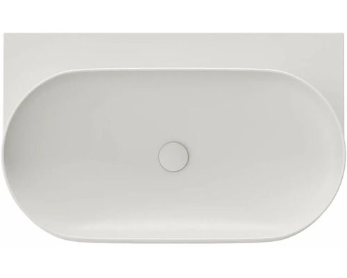 Pohled shora na oválné umyvadlo na desku