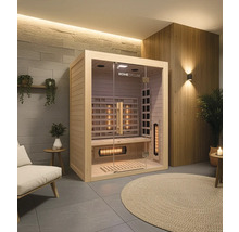 Interiérový pohled na saunu Home Deluxe se skleněnou přední stěnou, dřevěným obkladem a infračervenými zářiči