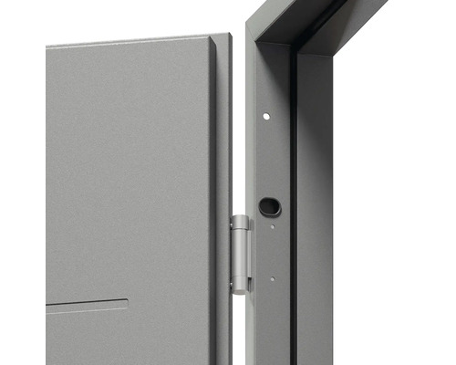 Detail ocelové zárubně s dveřním křídlem a závěsem