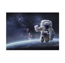 Fototapeta s astronautem ve vesmíru