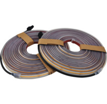 Dva LED pásky na rolích.