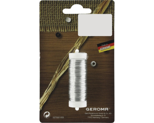 Cívka stříbrného drátu na obalu