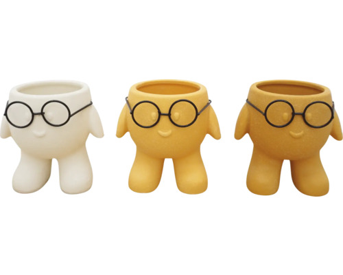 Tři květináče s designem brýlí