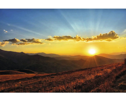 Obraz Decopanel Krajina 50 x 90 cm Horská krajina při západu slunce s mírnými kopci a teplým světlem