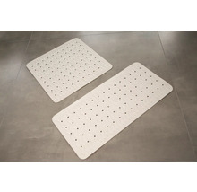 Dvě koupelnové podložky na dlaždicích