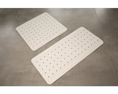 Dvě koupelnové podložky na dlaždicích