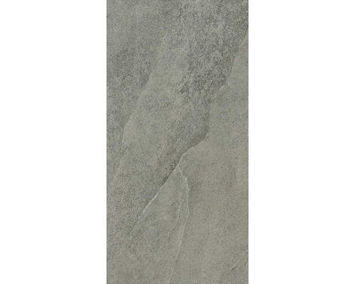 Detailní záběr šedé dlaždice s matným povrchem