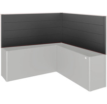 Rohová vana s černým obkladem stěn