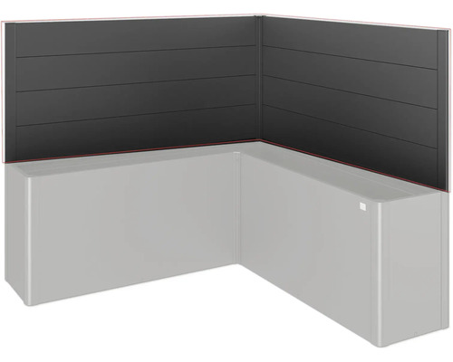 Rohová vana s černým obkladem stěn