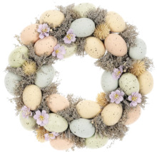 Dekorativní věnec na dveře s velikonočními vajíčky a květinami pro velikonoční dekoraci