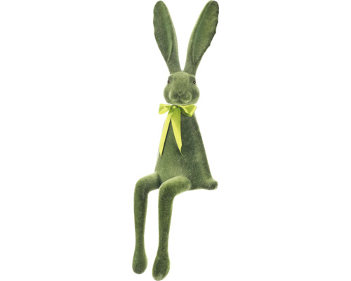 Dekorativní zelený zajíc s mašlí jako velikonoční dekorace