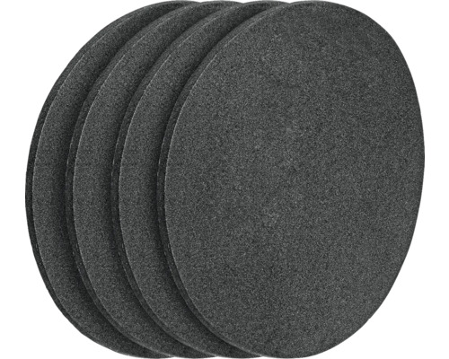 Několik kulatých brusných kotoučů ve stohu