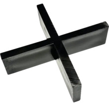 Dřevěná podložka ve tvaru kříže