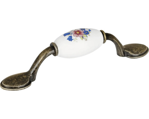 Nábytková úchytka z kovu a keramiky s květinovým vzorem