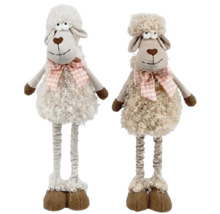 Dvě plyšové hračky ve tvaru ovcí s mašlemi