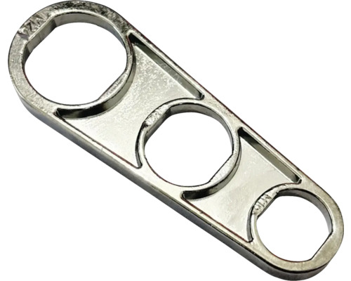 Kovový nástroj se třemi kulatými otvory