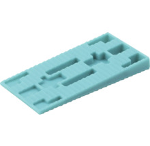 Obdélníková plastová podložka pod sklo s výřezy pro přesnou montáž oken a vyrovnání nerovností.